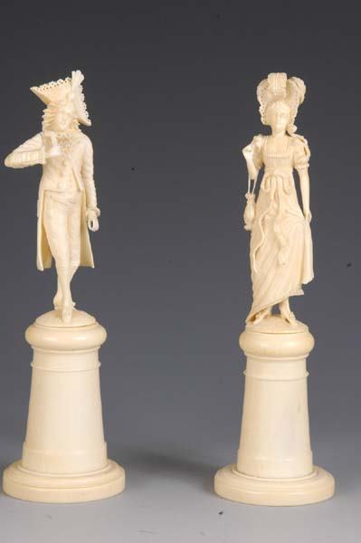 VERY FINE PAIR OF IVORY FIGURES OF MAN AND WOMAN