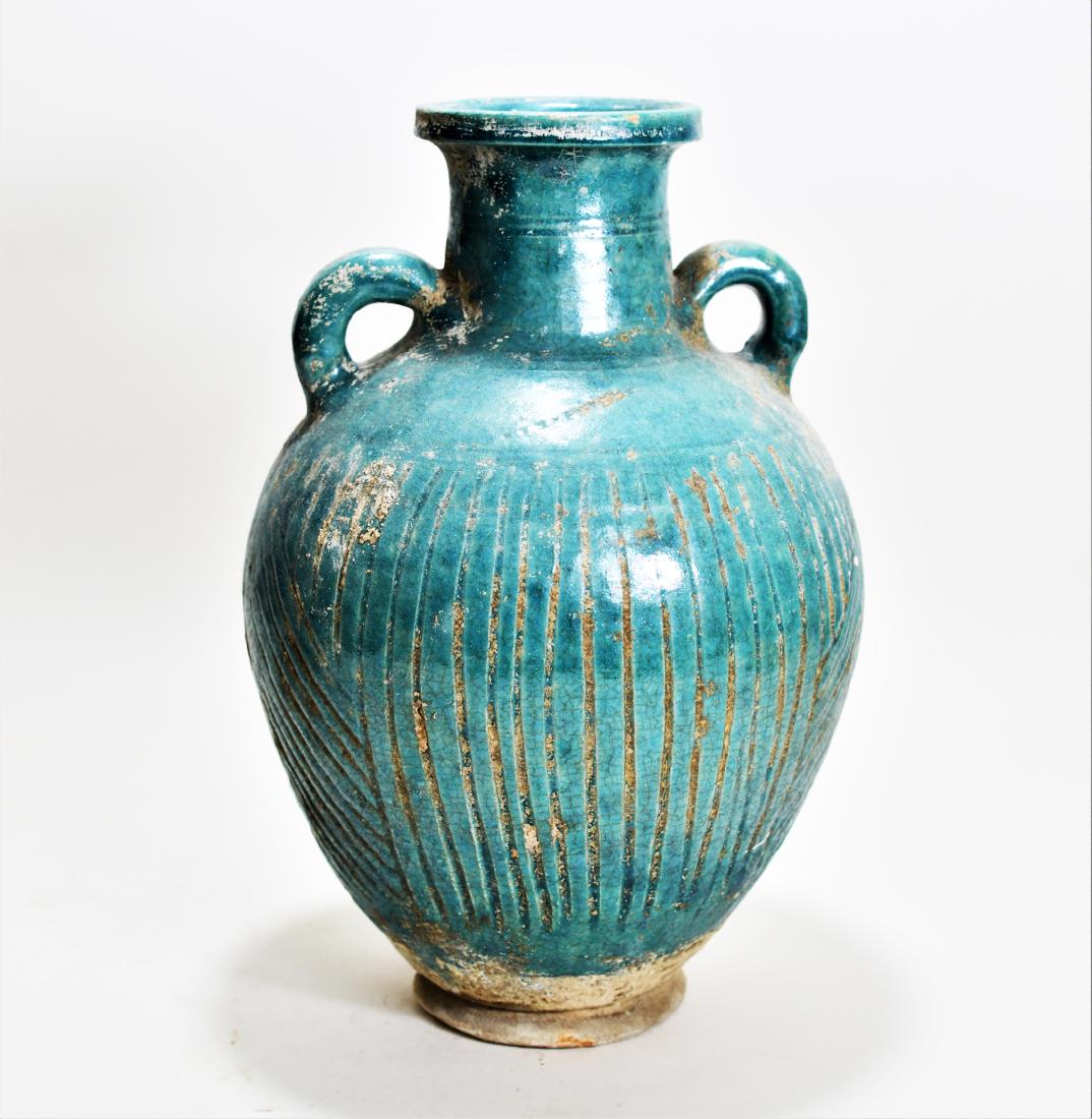 Islamic Kashan Green Glazed Large Pottery Amphora: Circa 12th-15th Century A.D. Size: 12 inches in height (30.5 cm.) Ex. British collection, acquired in 1983. Guaranteed to be authentic and as described, or your money back. All items offered by Aphrod