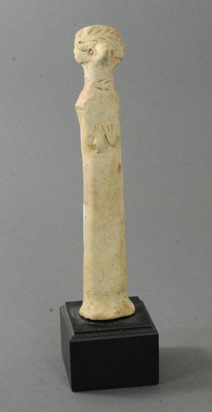 ANCIENT LARGE TERRACOTTA FIGURE OF A MALE IDOL: Excellent size for an example of this ilk. Has a beak like nose and piercing eyes. Comes with a custom display stand. Circa 1st Millennium B.C. Measurements: 6 1/2 in. H. without base (16.5 cm.) 8 in.