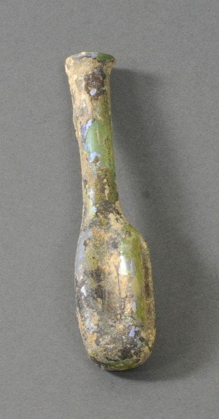 ANCIENT ROMAN RIBBED GLASS FLASK: Body has vertical ribs. The tall neck flares to a rounded rim. Circa 1st Century A.D. Measurements: 4 in. H. (10.2 cm.) Ex: Early Prominent American private collection of glass, 1980s; Ex: European ar