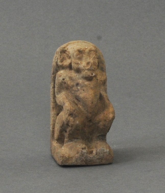 ANCIENT EGYPTIAN FAIENCE AMULET OF A SEATED BABOON: Circa 21st-22nd Dynasty, 3rd Intermediate period (1085-713 B.C.) Measurements: 2 5/8 in. H. (6.5 cm.) Ex: Important German private collection of Egyptian works; Ex: German art market. Reference No. AG