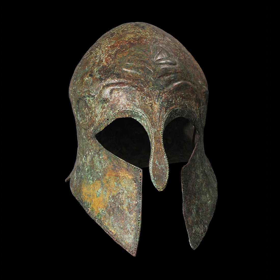 Aphrodite Gallery - Archaic Corinthian Bronze Helmet: Greek, ca. 6th Century B.C. Modeled from a single thin sheet of bronze that has been cast and then hammered. The type belonging to the latest of the three groups presently established for the classifi