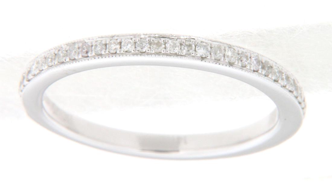 0.25 CTW Diamond Wedding Band Ring in 14K White Gold: REF-45Z5Y ---- SKU: JFJ-412688 ---- Genuine one Ladies 14K White Gold Wedding Band Ring. This contains 44 Diamond stones, with a Total Carat Weight of 0.25. Furthermore, Stone Color & Clarity are H &