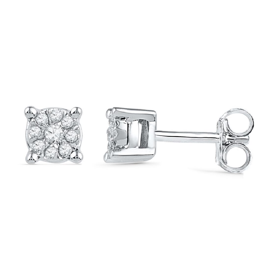 0.10 CTW Diamond Cluster Earrings 10KT White Gold -: REF-14M9H- SKU: GD101908 ---- 0.10 CTW Diamond Cluster Earrings 10KT White Gold Manufacturer's Suggested Retail Price: $590.00 Mainstone Type: Diamond @ 0.10ct Mainstone Color: J-K Mainstone Clarity: