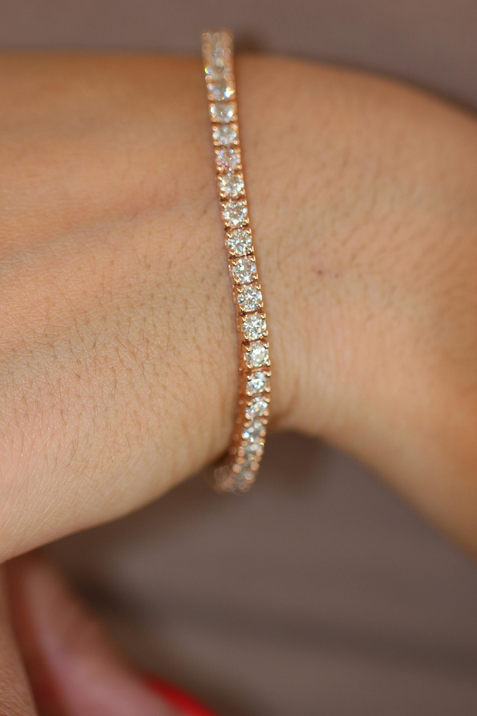 Natural 6.08 ctw Diamond Eternity Tennis Bracelet 18K: REF-512A5R ---- Natural 6.08 ctw Diamond Eternity Tennis Bracelet 18K Rose Gold ---- Manufacturer's Suggested Retail Price: $20000 Stone1 Weight: 6.08CT Stone1 Type: White Diamond Stone1 Color: F-G St
