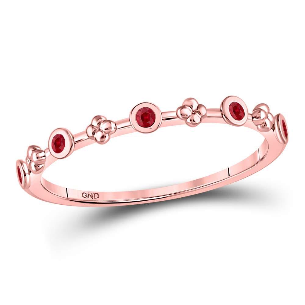 Round Ruby Dot Flower Stackable Band Ring 1/12 Cttw: REF-8R2K - SKU: GD128005 ---- Round Ruby Dot Flower Stackable Band Ring 1/12 Cttw 10kt Rose Gold Gemstone Details 1/12 Carats total weight Round Natural Ruby