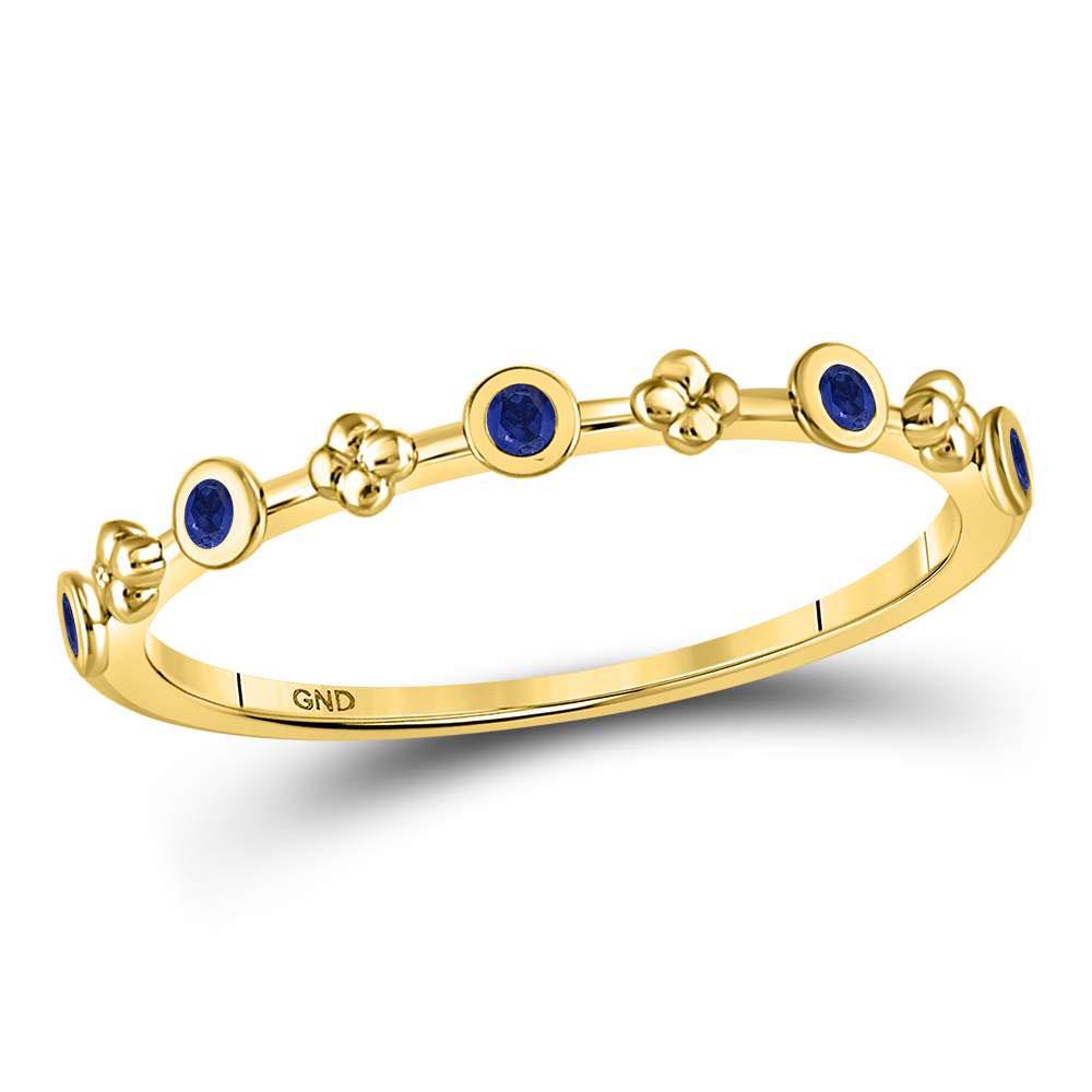 1/12 CTW Round Blue Sapphire Dot Flower Stackable Ring: REF-7H5W ---- 1/12 CTW Round Blue Sapphire Dot Flower Stackable Ring 10kt Yellow Gold Manufacturer Model: JSC-128007 Description 10kt Yellow Gol