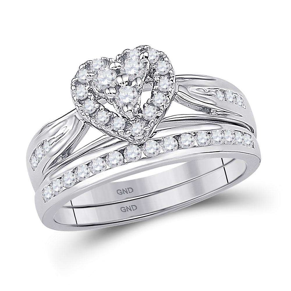 Diamond Heart Bridal Wedding Ring Band Set 1/2 Cttw: Diamond Heart Bridal Wedding Ring Band Set 1/2 Cttw 10KT White Gold Manufacturer Suggested Retail Price: $ 2530.00 10kt White Gold Round Diamond Heart Bridal Wedding Ring Band Set 1/2 Cttw. Combined d