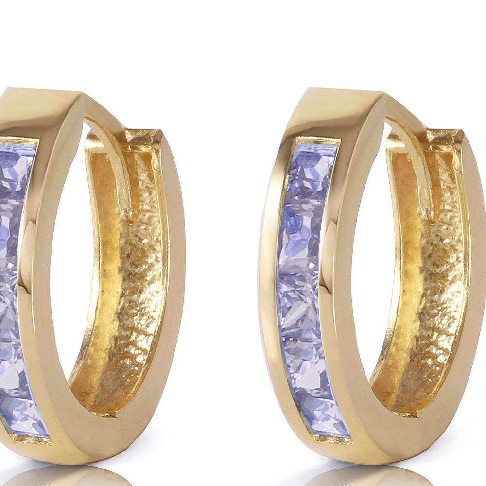 Genuine 0.95 ctw Tanzanite Earrings 14KT Yellow Gold: Genuine 0.95 ctw Tanzanite Earrings 14KT Yellow Gold Manufacturer's Suggested Retail Price: $1300.00 Genuine 14K Yellow Gold 0.95 ctw Tanzanite Earrings Gemstone(s): Tanzanite Total Gemstone weight: 0