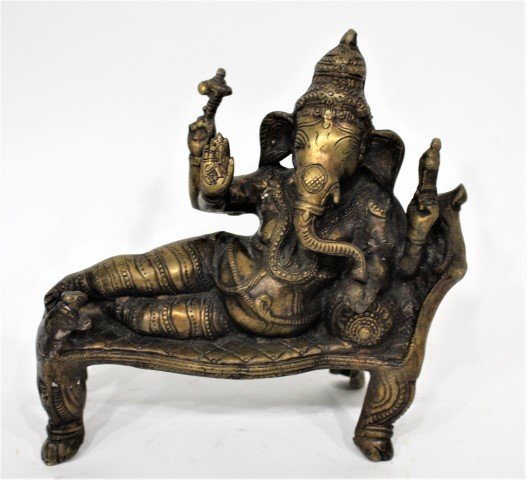 Antique India Hindu Bronze Ganesh Elephant Buddha: Antique India Hindu Bronze Ganesh Elephant Buddha reclining on a daybed. Size 11 in. height, 10 in. length, 4 in. wide.