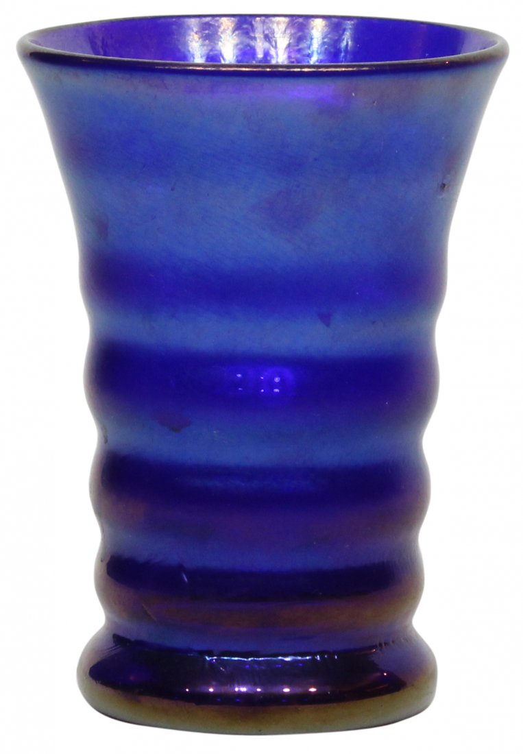 Vintage Magic Sands Iridescent glass cup: Vintage Magic Sands iridescent glass in a blue cup. Size is 5 inches in height.