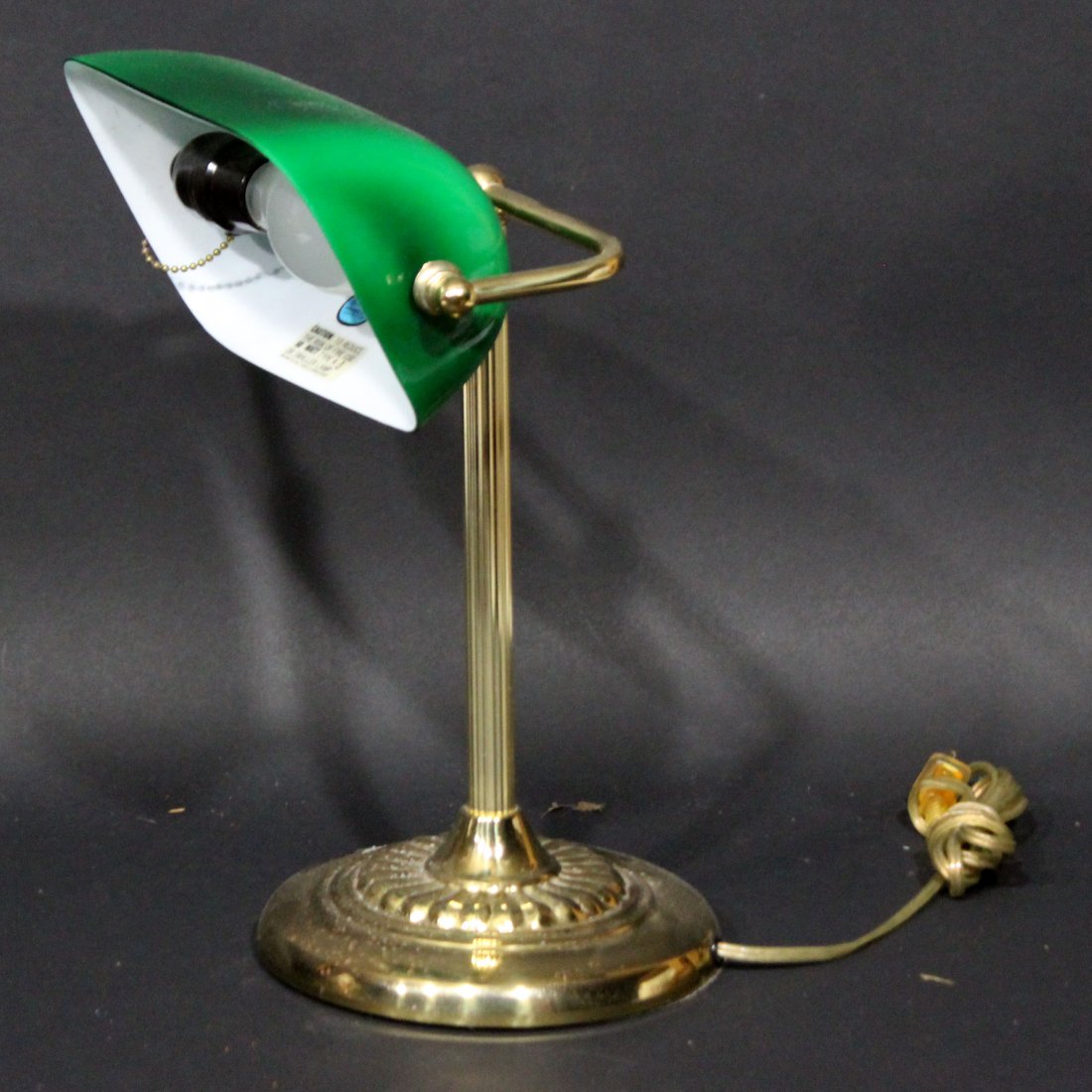 brass desk lamp with green glass shade