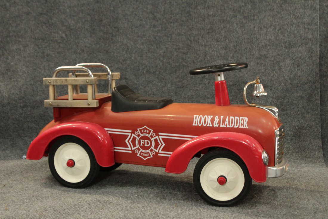 CHILD'S RIDE-ON TOY RED HOOK AND LADDER FIRE TRUCK