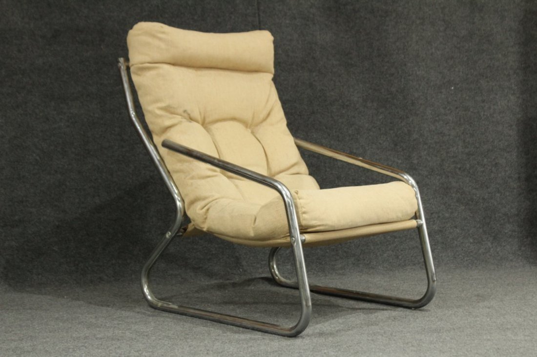 MID CENTURY MODERN TUBULAR CHROME LOUNGE CHAIR: MID CENTURY MODERN TUBULAR CHROME LOUNGE CHAIR.Original cushions.Size: 37 h , 24 w