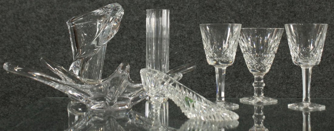 Waterford, Baccarat, Heritage, Cofrac: Waterford wine glasses (3), Baccarat vase (tall skinny), Heritage (shoe high heel ), Cofrac free form bowl and curved vase. Range in heights 3 : 7.5 inches
