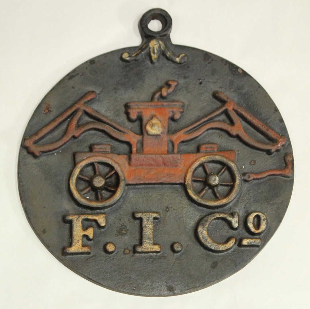 CAST IRON HOME FIRE PLAQUE, F. I. CO. Fire Pumper