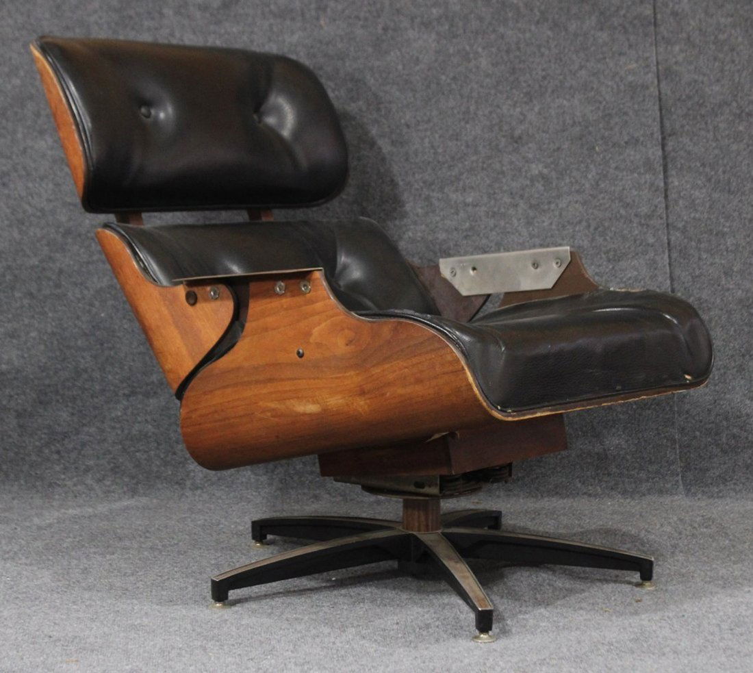 Charles Eames for Herman Miller style lounge chair: Charles Eames for Herman Miller style lounge chair by the Charlton Company, Condition: chair has missing arms and a tear in the bottom leather Size: 32 h , 29 w, inches ,