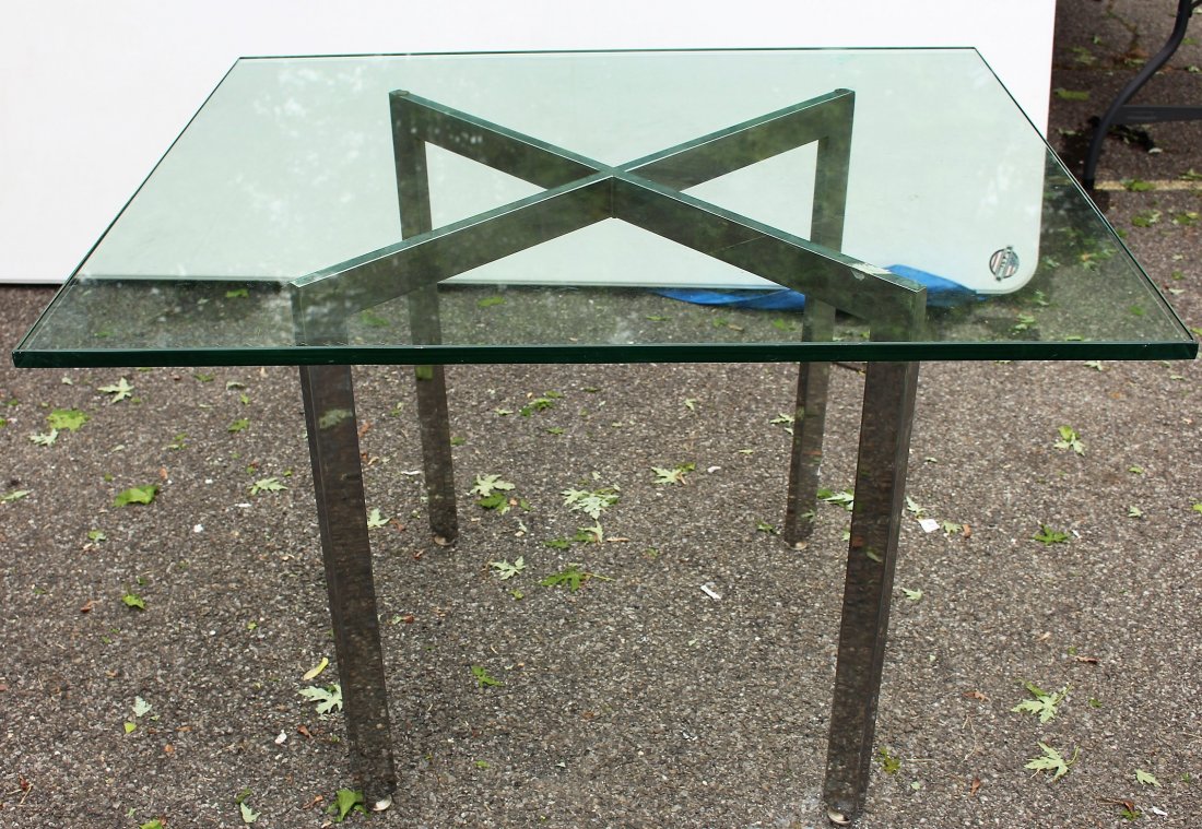 MILO BAUGHMAN CHROME FLATBAR CROSS BASE TABLE GLASS TOP: MILO BAUGHMAN CHROME FLAT BAR CROSS BASE TABLE GLASS TOP.Clean , no flaws on glass top.Size: 29.5 in. height, glass top is 42 in. x 36 in., the glass is 3/4 inches thick.