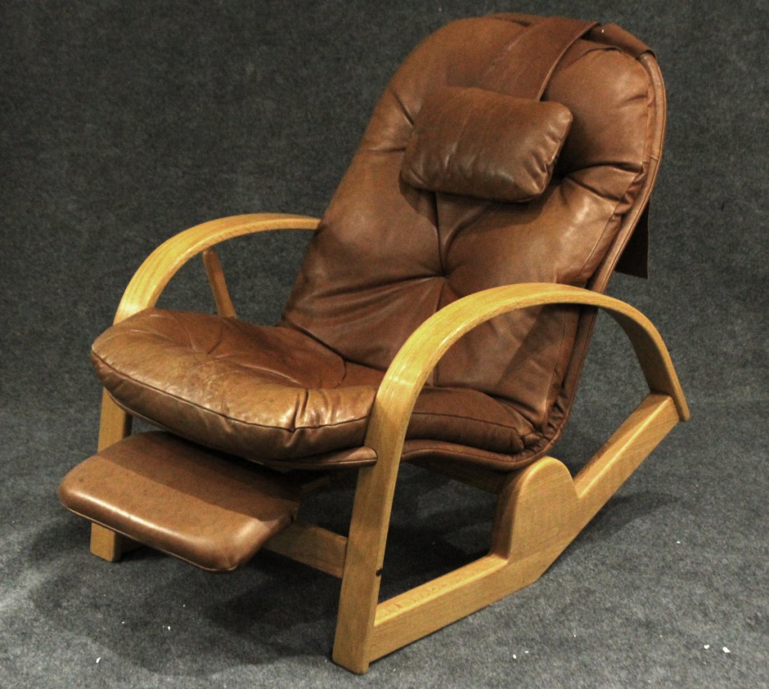 KLEIN DESIGN MID CENTURY BROWN LEATHER LOUNGE RECLINER: KLEIN DESIGN MID CENTURY BROWN LEATHER LOUNGE RECLINER. Very clean, sturdy, brown leather, original label. Size: 35 h , 26 w