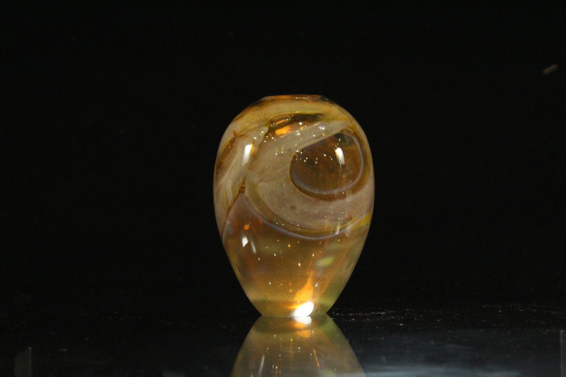 Studio hand blown art glass vase signed: Studio hand blown art glass vase signed , loetz style oil spotting in transparent orange. Size: 8 h inches