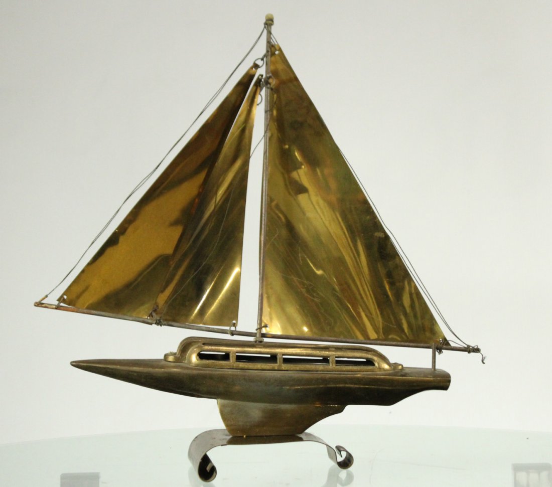Mid-Century Modern Metal Boat Statue With Brass Sails: Mid-Century Modern Metal Boat Statue With Brass Sails. Size: 18 h