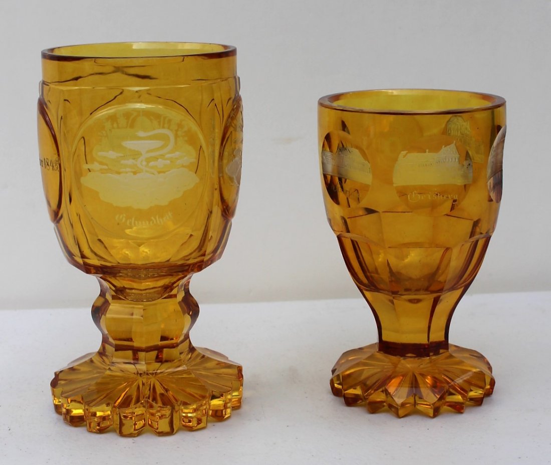 Two [2] Antique AMBER CHALICE Intaglio Scenes Date 1843: Two [2] Antique AMBER CHALICES Intaglio Scenes Date 1843; German. High Quality glass. Size: 6.5 in. height, 3.5 in. wide; 5.5 in. height, 3 in. height.