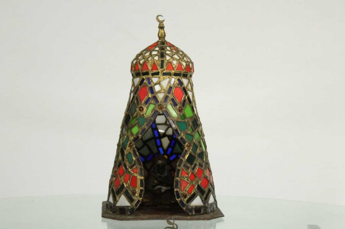 Antique COLD PAINT BRONZE AND LEADED GLASS ARABIAN LAMP: Antique COLD PAINT BRONZE AND LEADED GLASS ARABIAN LAMP.Superb quality, all the leaded glass is in good shape. Arab sitting inside the leaded tent lamp.Size: 11 in. height.