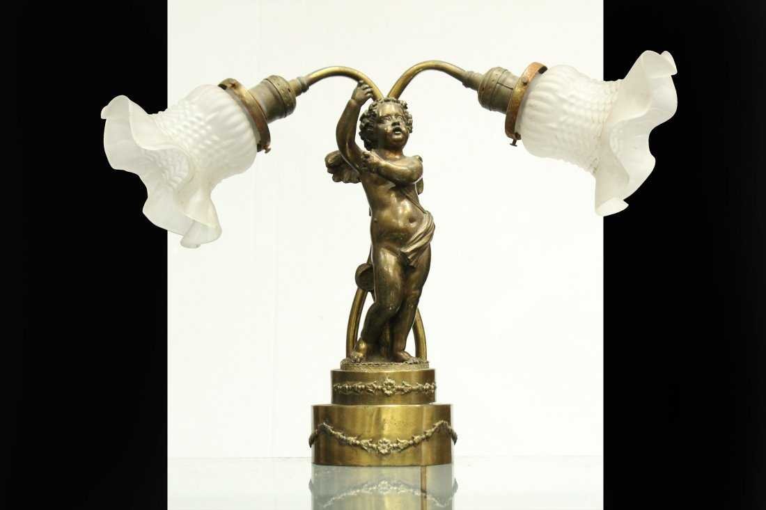 CLASSICAL CUPID FIGURE 2-Light MUSIC ROOM PIANO LAMP: CLASSICAL CUPID FIGURE 2-Light MUSIC ROOM PIANO LAMP; having satin glass flared shades. Size: 12.5 h 17.5 w