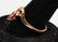10 K YELLOW GOLD RUBY AND DIAMOND RING - 9