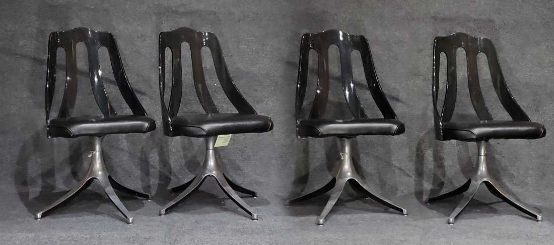 SET OF 4 SMOKED LUCITE SWIVEL CHAIRS SPACE AGE DESIGN: SET OF 4 SMOKED LUCITE SWIVEL CHAIRS SPACE AGE DESIGN Size: 34" 17 seat h, 18"w