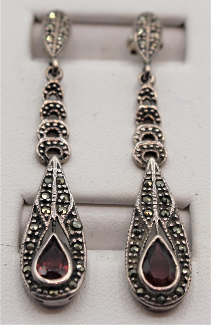 Sterling Garnets & Marcasite Teardrop Earrings: STERLING GARNETS & MARCASITE TEARDROP EARRINGS.size: 2 in. length, 3/8 in. wide