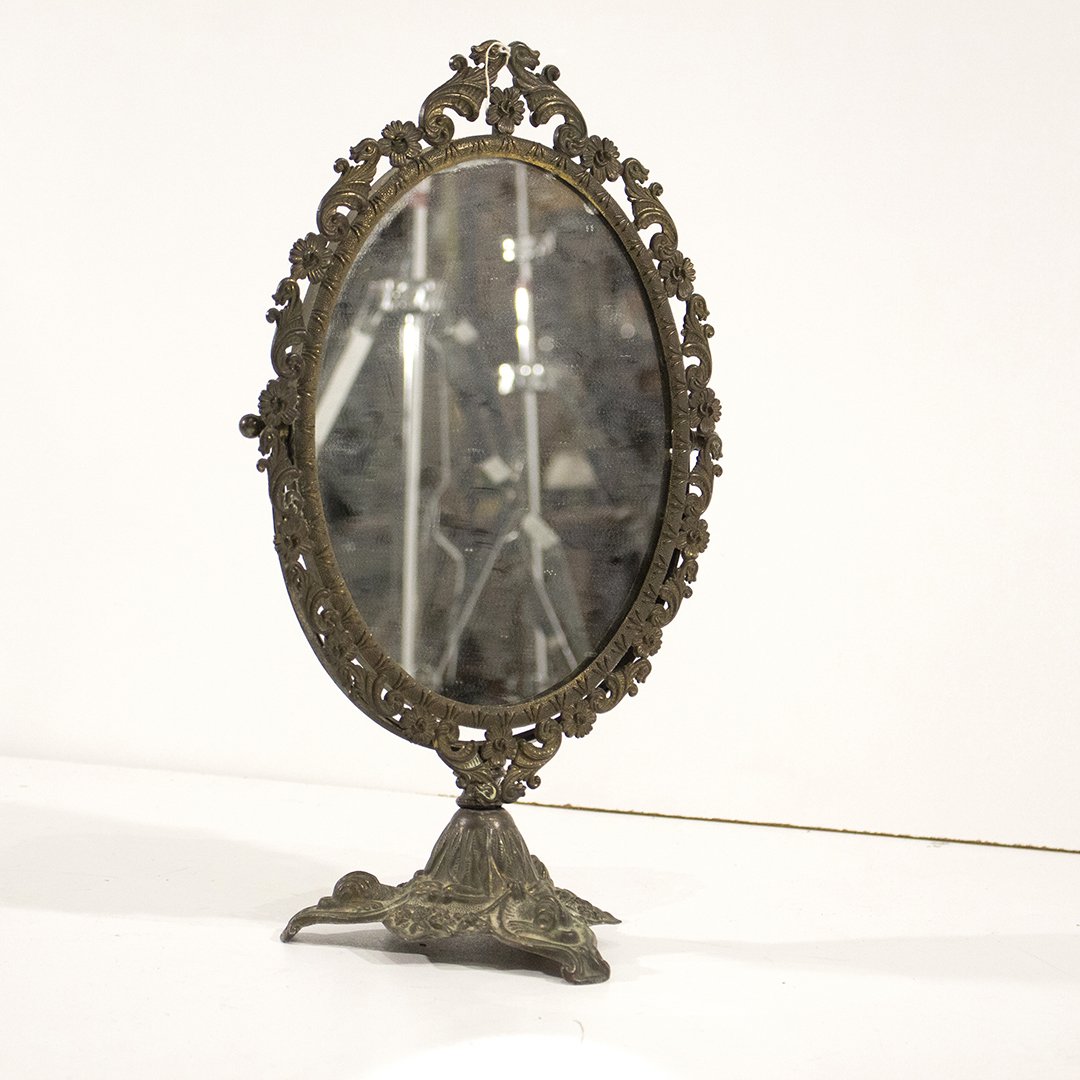 Antique Metal Mirror on stand victorian: Antique Metal Mirror on stand victorian Size: 10 h , 8 w