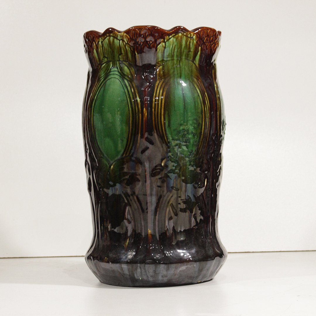 Vintage Majolica Umbrella Stand: Vintage Majolica Umbrella Stand in earthy tones, brown and greens , glazed porcelain . Size 18.5 h , 10.5 w