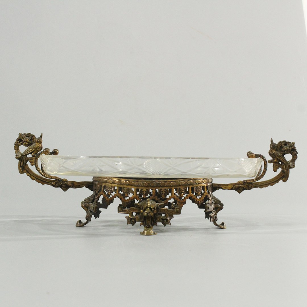 19th C. Cut Glass Oblong Bowl Bronze Holder Bird Lion: 19th C. Cut Glass Oblong Bowl mounted in Bronze Holder , Bird and Lion handles. Size: 4.5 in. height, 14.5 in. length, 8.5 in. wide.