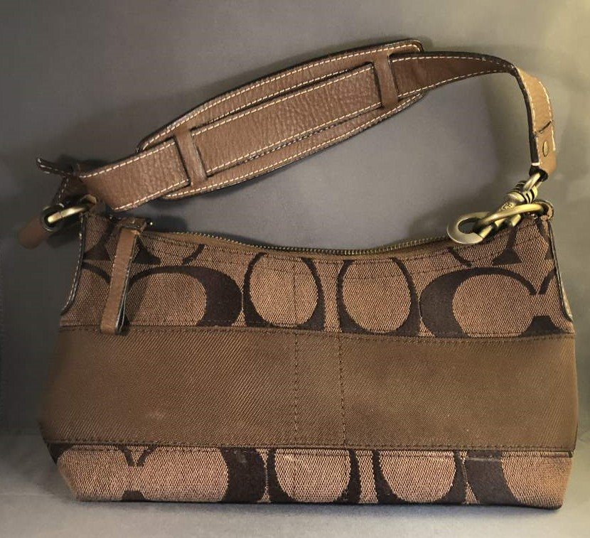 COACH - Brown Hand Bag: COACH - Brown Hand Bag. Size: 11.5 in. length; 5 in. wide.