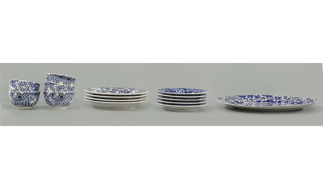Fourteen Assorted Ralph Lauren Plates, Bowls, Platter: Fourteen [14] Assorted Ralph Lauren, Made in Italy, Blue and White Porcelain Plates, Bowls and a Platter. Sizes: 4 bowls 5.5 in. diameter; 5 plates 8.5 in. diameter; 4 plates 10.5 in. diameter; and pl