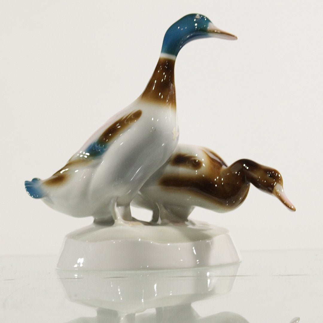Zsolnay Hungary Porcelain Grouping Two Geese. Marked: Zsolnay Hungary Porcelain Grouping Two Geese. Marked on base. Size: 7 h , 7 w