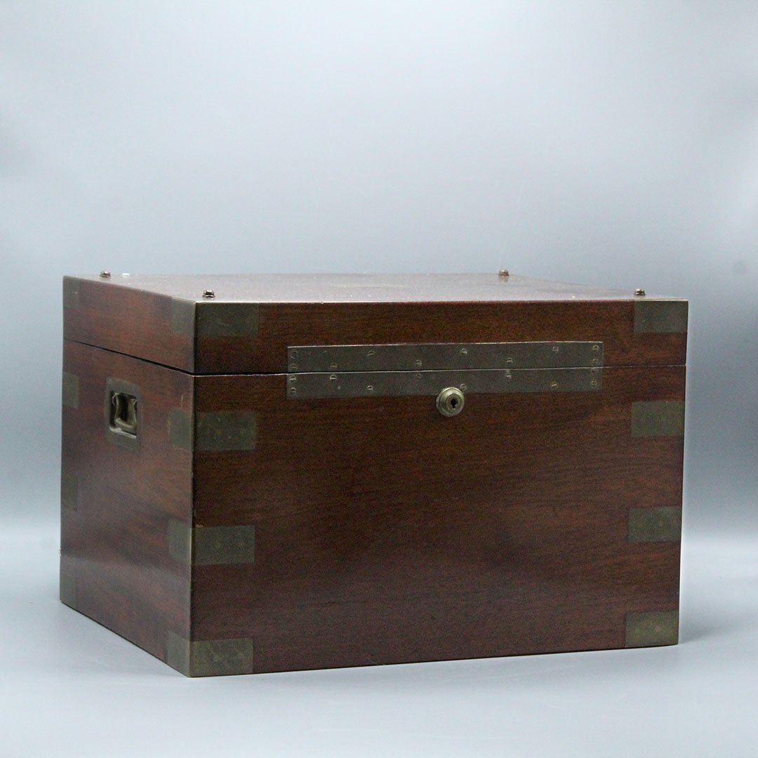 Edwardian Mahogany Brass Humidor by Benson Hedges: Edwardian Mahogany and Gilt Brass Bound Humidor by Benson and Hedges New York Humidor with a stainless liner inside and brass edging with ALE on boxes wood top. Size: 10 h , 15 x 12