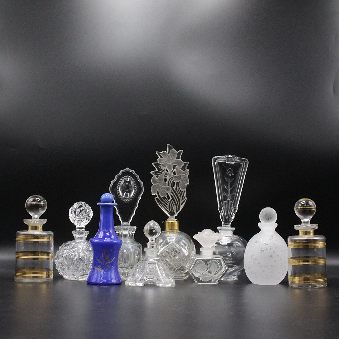 Collection of 10X glass perfume bottles (1 of 9)