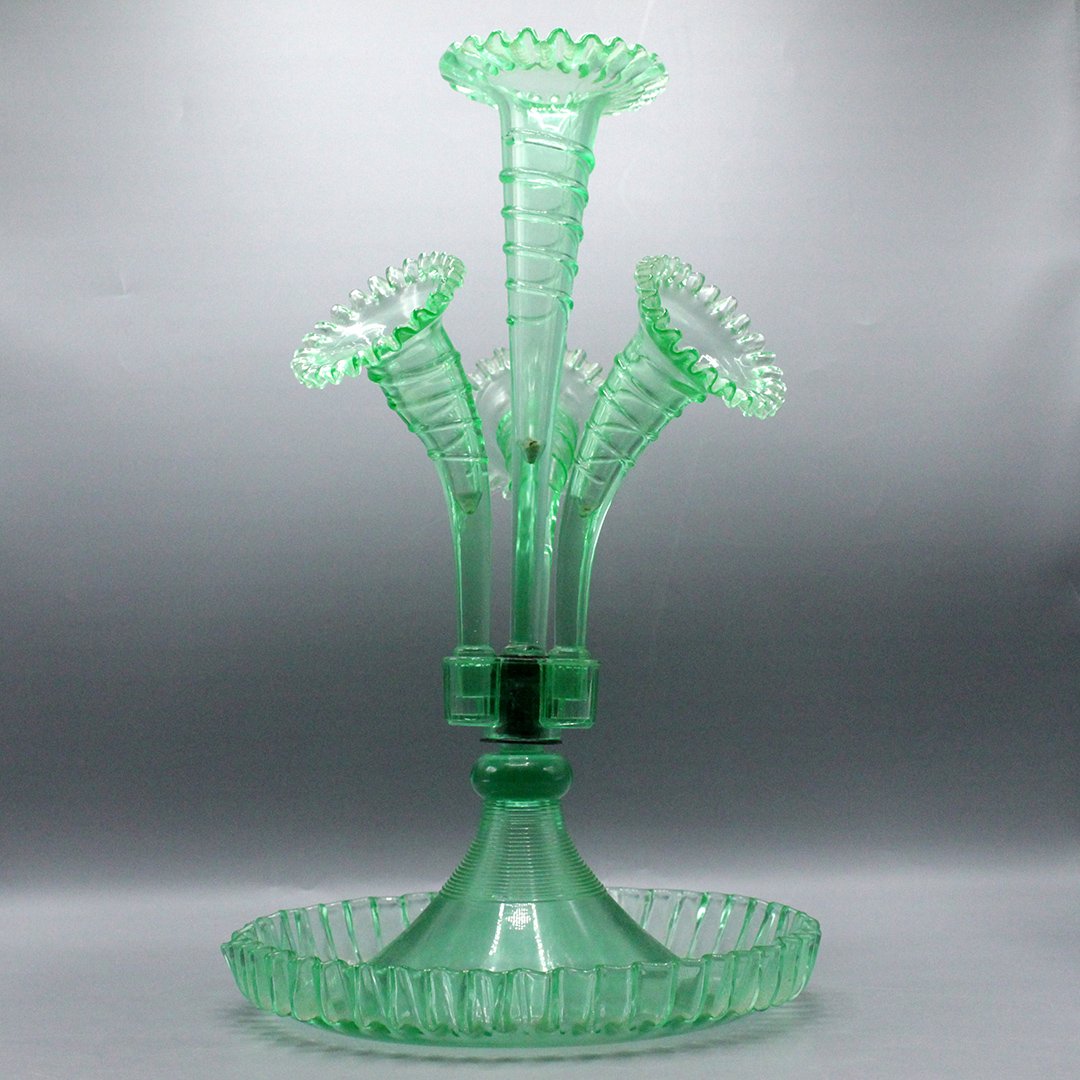 Victorian Green Glass Epergne Center Stem with 3 Stems: Victorian Green Glass Epergne Center Stem with 3 Stems. on holder section there is a flaw See Pic. Size: 18 x 10 inches