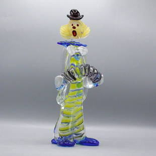 Morris Lapidus, Signed Studio Art Glass Clown Figure: Morris Lapidus, Signed Studio Art Glass Clown Figure playing an accordion. Signed and dated on base. Size: 14 x 5 inches