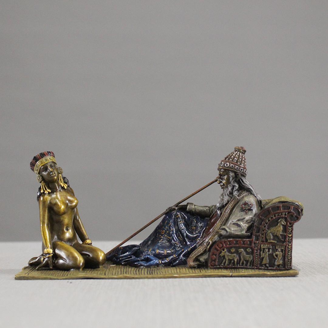 after Bergman Austrian Bronze Arabian Nude and Wizard: after Bergman Austrian Bronze Arabian Nude and Wizard. Signed. Polychrome patina. Size: 3.25 h , 7 w