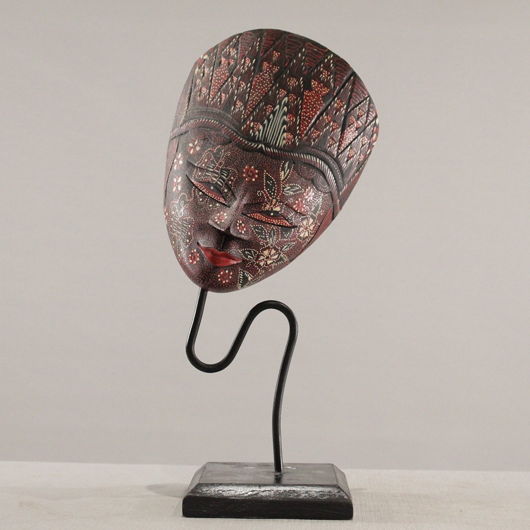 Indonesian Teak Decorated Face Mask on Stand: Indonesian Teak Decorated Face Mask on Stand. Size: 15.5 in. height, 6.5 in. wide