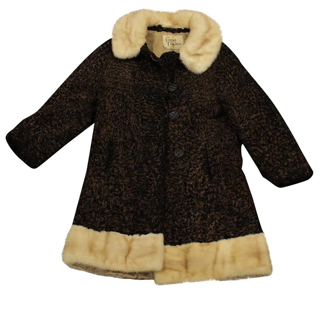 VINTAGE FUR COAT - Persian Lamb Wool with Blond Mink: VINTAGE FUR COAT - Black Persian Lamb Wool with Blond Mink Collar and Hem. Size: 22 inches sleeve, 36 inches length, 32 inches chest