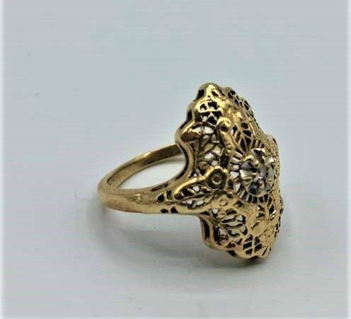 14 K Yellow Gold Ornate Edwardian Ring Diamond Center: 14 K Yellow Gold Ornate Edwardian Ring Diamond Center. Ring size: 6.25 in.; Weight: approx. 2.4 dwt