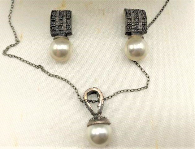 Sterling, Marcasite and Faux Pearls Necklace Earrings: Sterling, Marcasite and Faux Pearls Necklace Earrings set.Size: earrings 3/4 in. length, pendant 3/4 in. length, chain 16 in. length