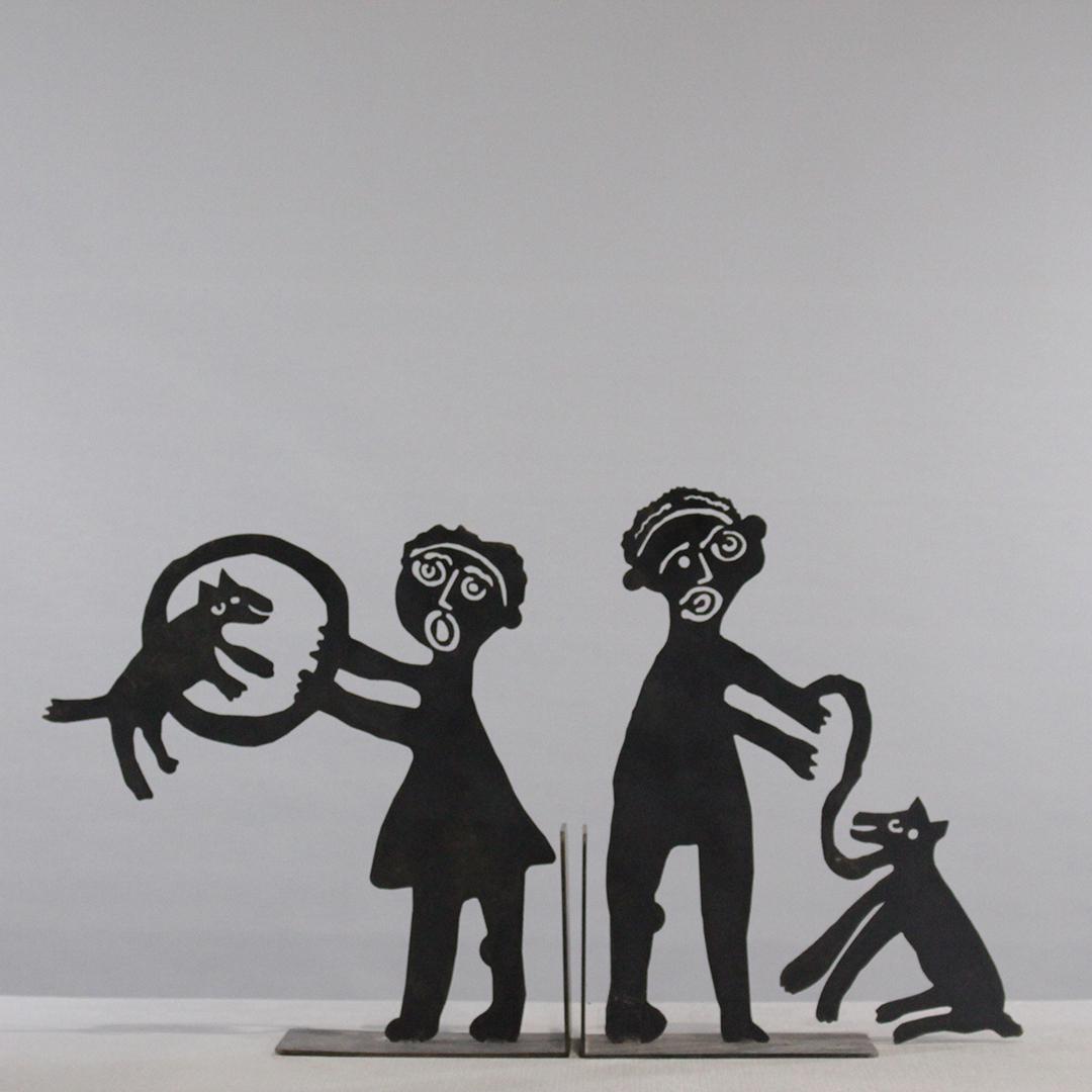 Black Americana Folk Art Iron Cut Out Figure Sculptures: Two [2] Black Americana Folk Art Iron Cut Out Figure Sculptures. Figures with Cat doing Tricks. Vintage. Size: 14.5 x 14.5 inches, 15.5 x 12 inches