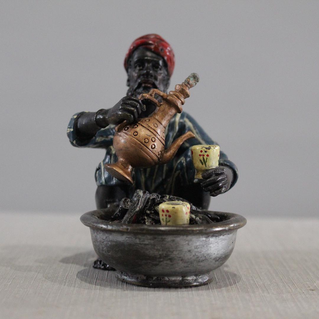 after Bergman Austrian Bronze Arabian Man Serving Tea: after Bergman Austrian Bronze Arabian Man Serving Tea. Original Patina Finish Size: 3.75 x 3.5