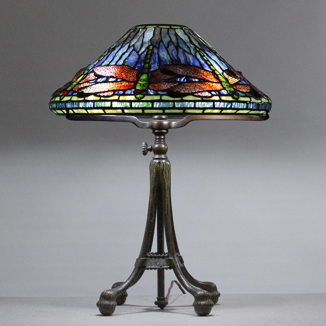 TIFFANY STUDIOS NEW YORK Dragonfly Lamp Signed S&B: TIFFANY STUDIOS NEW YORK Dragonfly Lamp Signed Shade and base. Bronze telescoping base, signed on leg Tiffany Studios New York. Leaded glass Dragonfly shade signed Tiffany Studios New York. Size: 26 m