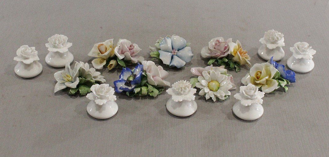 14 Assorted Porcelain Flowers Dining Table Name Markers: 14 Assorted Porcelain Flowers Dining Table Name Markers including Capodimonte. A few has chips. Sizes range from 1.75 in. to 3 in.